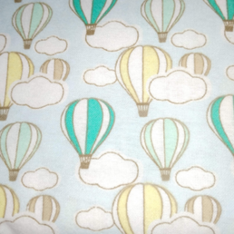 couverture pour bebe a motifs de montgolfières jaunes et vertes boutique petite canaille
